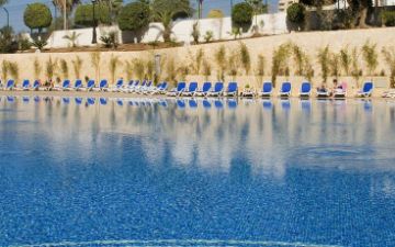 Schwimmbad mit Solarium Pirámides Resort 